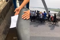Người phụ nữ để lại xe máy kèm giấy nhắn rồi nhảy sông tự tử 