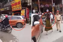 Video: Bị CSGT nhắc nhở, nữ tài xế đỗ ô tô giữa đường chống đối