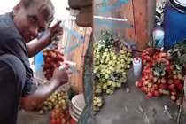 Video: Choáng váng bắt gặp người bán hàng phun sơn lên chùm nho