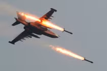 Không quân Nga tấn công, bắn phá dữ đội căn cứ phiến quân ở Syria 