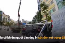 Phát hoảng cột đèn rơi trúng đầu người đi đường ở Trung Quốc 