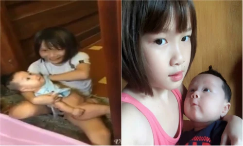 “Bé gái đảm đang nhất miền Bắc” tắm cho em cực khéo