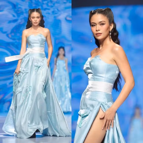 Á hậu Mâu Thủy sải bước trên sàn diễn.