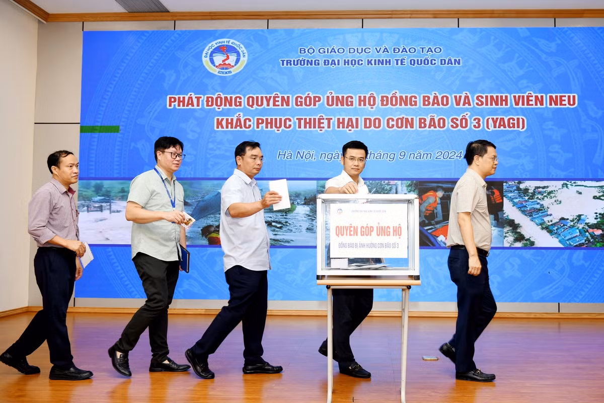 Trường ĐH Kinh tế quốc dân tạm hoãn khai giảng do mưa lũ Truong DH Kinh te quoc dan tam hoan khai giang do mua lu
