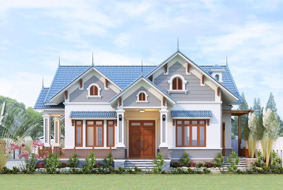 Nhà vườn 1 tầng có thiết kế mái thái hiện đại với kiểu mái giật cấp màu xanh xám. Ảnh: Wedo.