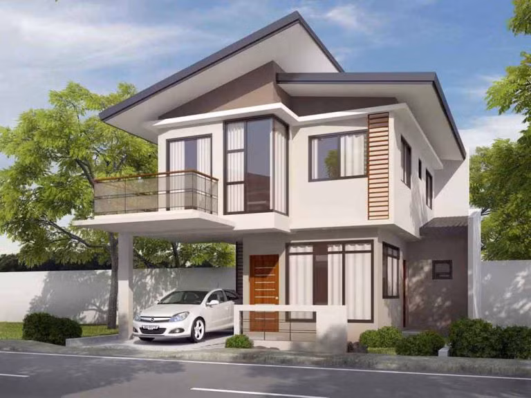 Nhà mái lệch 2 tầng đẳng cấp với diện tích 100m2. Những ô cửa sổ lớn và ban công rộng đón nắng giúp nhà luôn thoáng mát. Ảnh: Noithatduongdai.