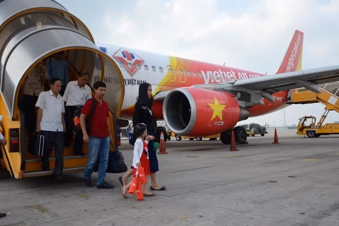 Sot xinh xich ve may bay gia re dau nam 16.000 dong/chang-Hinh-2
