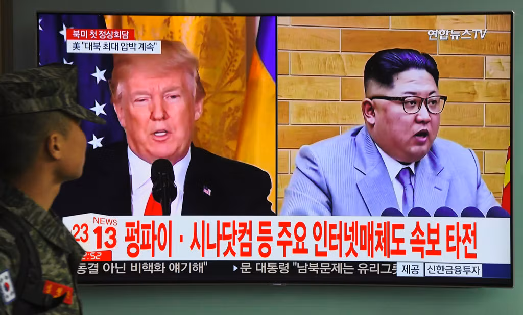 Bản tin truyền hình Hàn Quốc phát sóng bản tin về việc Tổng thống Mỹ Trump đồng ý gặp nhà lãnh đạo Triều Tiên Kim Jong-un. Ảnh Getty