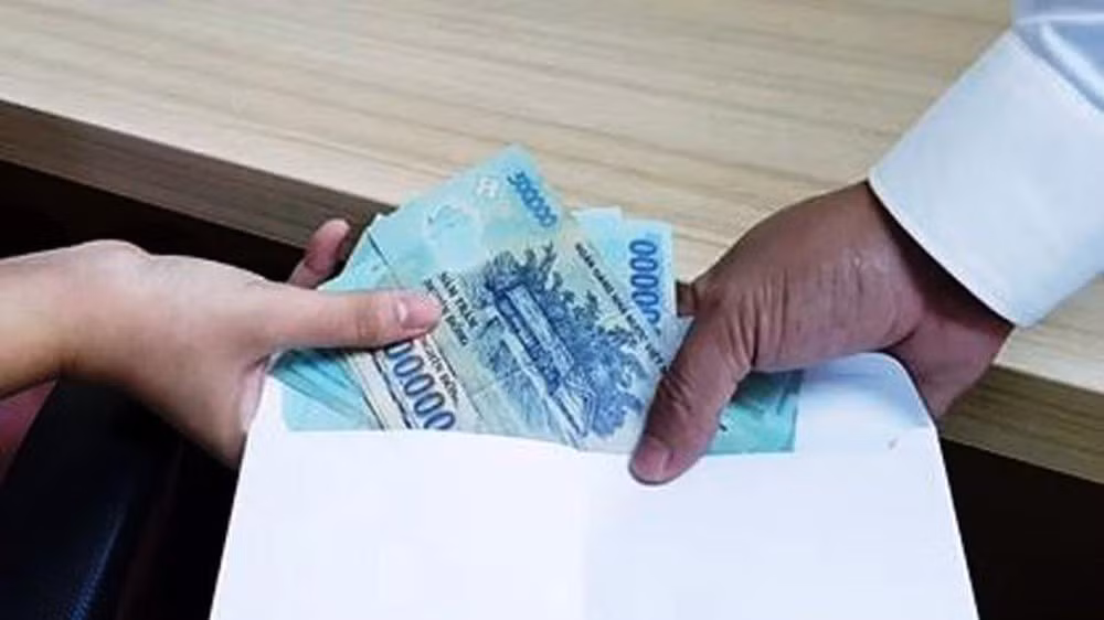 Lien quan nhan mai lo, 9 canh sat giao thong o Tien Giang bi ky luat