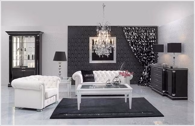 Bạn cũng có thể bố trí thảm đen với bàn ghế màu trắng để không gian hài hòa.