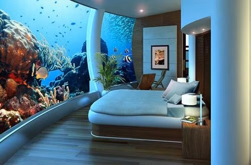 Poseidon (đảo Katafanga, Fiji): Sẽ không còn gì tuyệt vời hơn khi ở trong những căn phòng ngắm vẻ đẹp của đại dương, những sinh vật biển đa sắc màu như tại khu nghỉ dưỡng 5 sao mang tên Poseidon ở quần đảo Fiji. Quốc đảo nhỏ bé này đã có sẵn nét xinh đẹp với những bờ biển tuyệt vời, nước biển xanh ngắt và những rặn san hô quý hiếm.