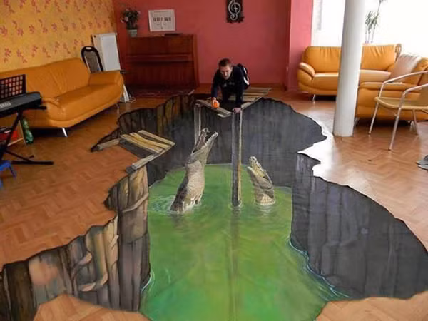 Không ít người phải giật mình với tấm sàn nhà 3D hồ cá sấu này.