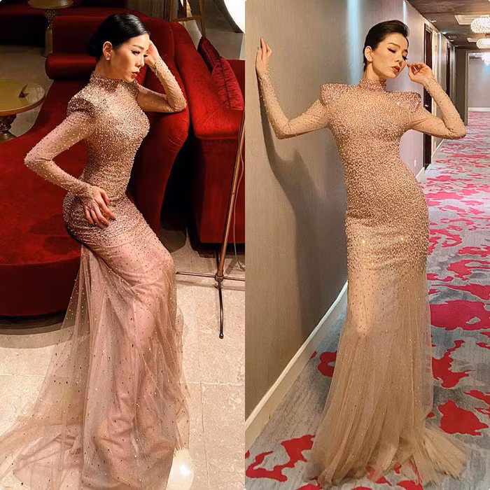 Cô sẵn sàng đính lên váy áo hàng loạt sương sa giúp mình tỏa sáng như một viên kim cương trên sân khấu.