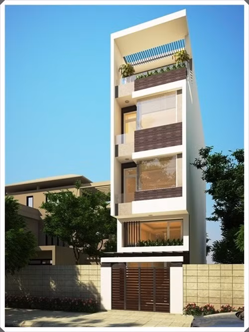 Nhà phố 4 tầng chừa 2m làm sân và bãi đậu xe phía sau 1m làm giếng trời đón gió mát. Ảnh: Xuongnoithat.