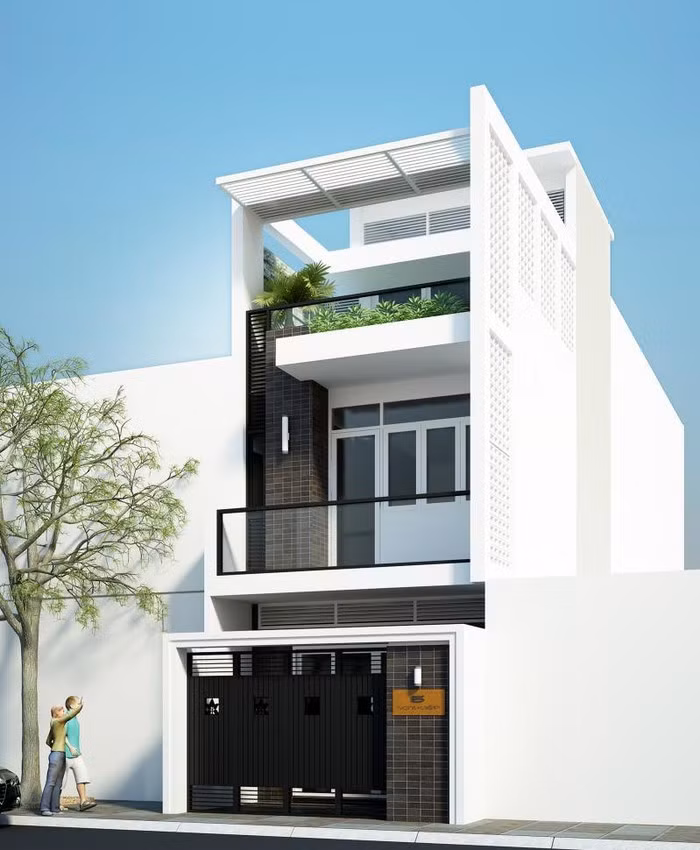 Nhà 3 tầng mái bằng có khoảng sân nhỏ trước nhà vừa là chỗ vui chơi cho trẻ em vừa là chỗ để xe của gia đình. Ảnh: Kientrucsuvietnam.