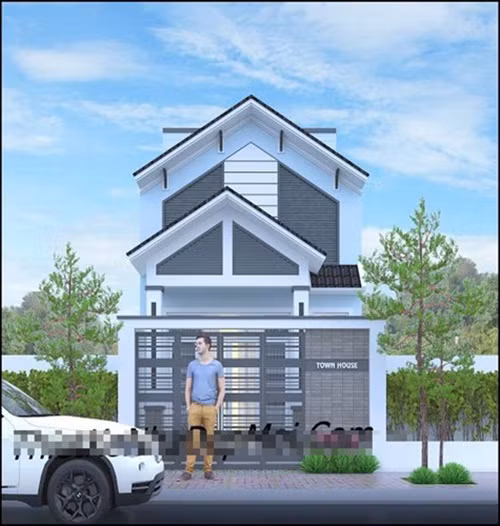  Biệt thự 2 tầng có gác lửng gồm 3 phòng ngủ, 1 phòng thờ, đồng thời tích hợp thêm công năng gara để xe trong phòng khách. Ảnh: Thietkenhadepmoi.