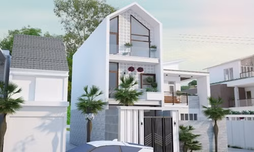 Nhà ống thiết kế thoáng mát, với gam màu sơn trắng chủ đạo kết hợp lan can và mặt tiền làm bằng kính cường lực. Ảnh: Nhadepktv.