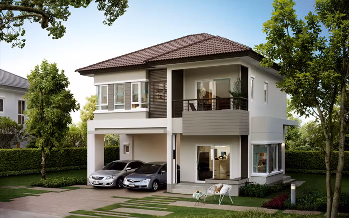 Mái ngói nâu sẫm kết hợp cùng những màu sắc dịu nhẹ của 4 mặt tường giúp ngôi nhà có vẻ ngoài thân thiện giữa khung cảnh sân vườn xanh mát. Ảnh: Kientrucboba.