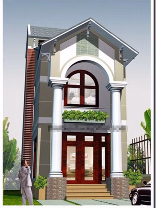 Nhà 2 tầng mái thái kiểu dáng đơn giản được xây trên tổng diện tích đất 65m2. Đơn giản nhưng kiến trúc rất vững chắc với hai chiếc cột trụ to phía trước. Ảnh: Thietkenhadepmoi.