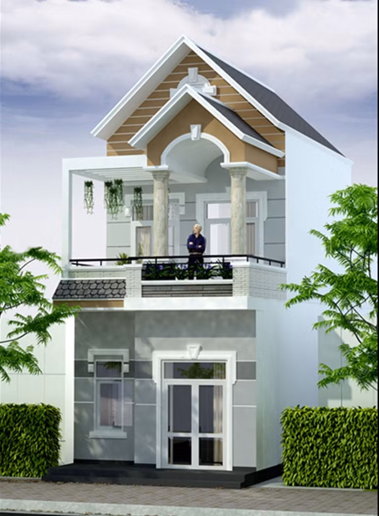 Mặt tiền ấn tượng với kiểu mái thái truyền thống. Tầng 1 thiết kế đơn giản với cửa kính, tầng 2 có ban công nhỏ trồng hoa. Ảnh: Arcviet.