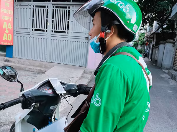 “Dong bang” Grab, Be, Go-jek, shipper... soi cuoc song tai xe xe cong nghe-Hinh-3