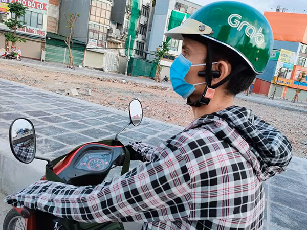 “Dong bang” Grab, Be, Go-jek, shipper... soi cuoc song tai xe xe cong nghe-Hinh-4