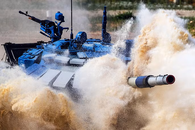 Màn thi lội nước - một trong những chướng ngại vật mà đội Syria chưa từng vượt qua ở quê nhà vì Syria vốn toàn sa mạc. Nguồn ảnh: TASS.