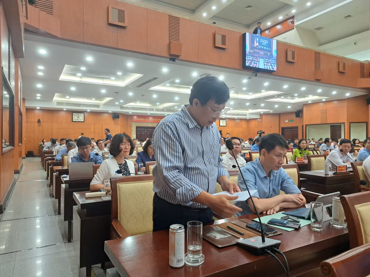 TP HCM: Đã thông qua nghị quyết, sao vẫn rà soát nhiều nội dung? - Hình 2 TP HCM: Da thong qua nghi quyet, sao van ra soat nhieu noi dung?-Hinh-2