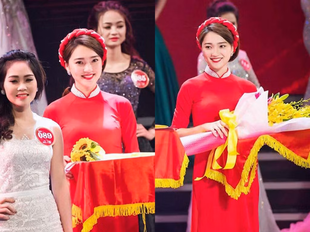 Nguyễn Ngọc Nữ (23 tuổi) tình cờ xuất hiện trong bức ảnh trao giải hoa khôi của cuộc thi Người đẹp Kinh Bắc với vai trò lễ tân bê hoa. 9X mới tốt nghiệp Học viện Nông nghiệp Việt Nam và đã có bạn trai từ thời đi học.