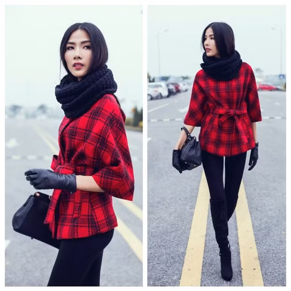 Hoàng Thùy trẻ trung với áo khoác kẻ đỏ kết hợp cùng legging, khăn ống và boot cổ ngắn, người đẹp còn ra dáng một fashionita khi lựa chọn phụ kiện găng tay và túi da ấn tượng. Ảnh: emdep.vn.