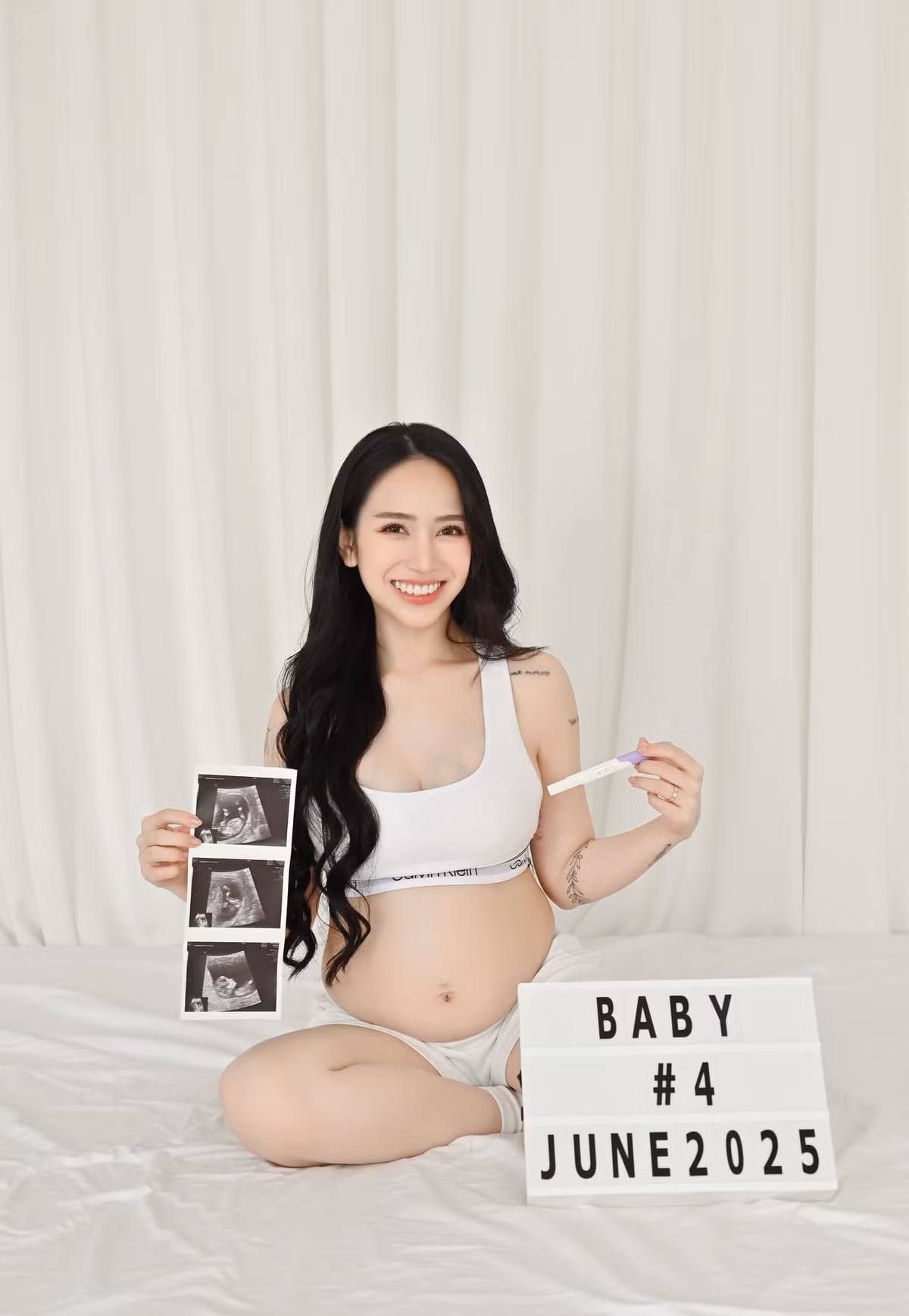 Ái nữ đại gia ngành nhựa rạng rỡ trong bộ ảnh thông báo có nhóc tì thứ 4.