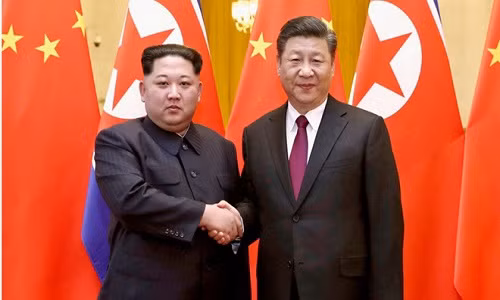 Ông Kim thăm Trung Quốc trong hai ngày 19-20/6. Ảnh: AP.