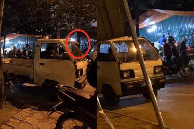 Xe công vụ có người mặc sắc phục Công an (khoanh đỏ), rạng sáng đến chợ tạm, không phép trên phố Trần Quốc Vượng trước đó nhưng mọi hoạt động buôn bán, tụ họp ở đây vẫn diễn ra nhộn nhịp.