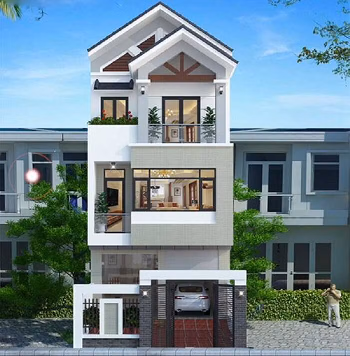 Ngôi nhà với tông màu trắng chủ đạo kết hợp với hệ cổng và cửa kính viền đen nổi bật, mảng tường được ốp đá màu xám nhẹ trang nhã. Ảnh: Xaydungankhang