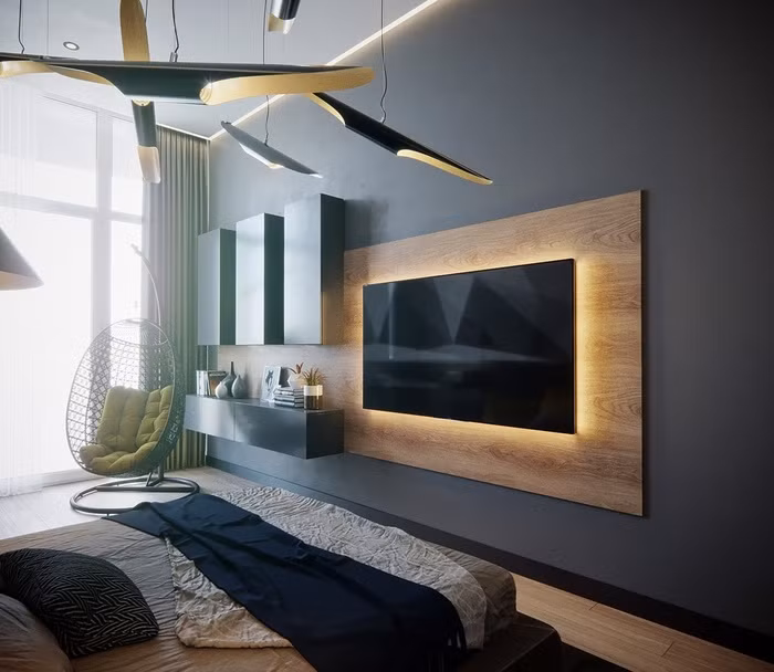 Bố trí TV liền tường là sự lựa chọn của nhiều chủ nhà để tiết kiệm không gian. Những mẫu kệ tối giản cũng góp phần tạo nên điểm nhấn thú vị cho phòng khách.