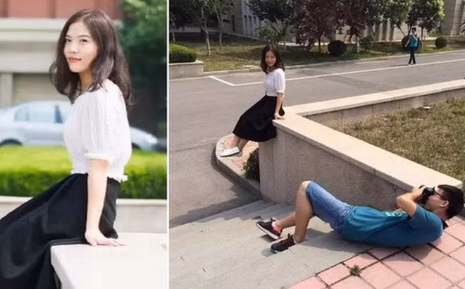 Chàng trai sẵn sàng nằm dài dưới nền đất để bắt góc chụp thật chuẩn cho cô bạn này.