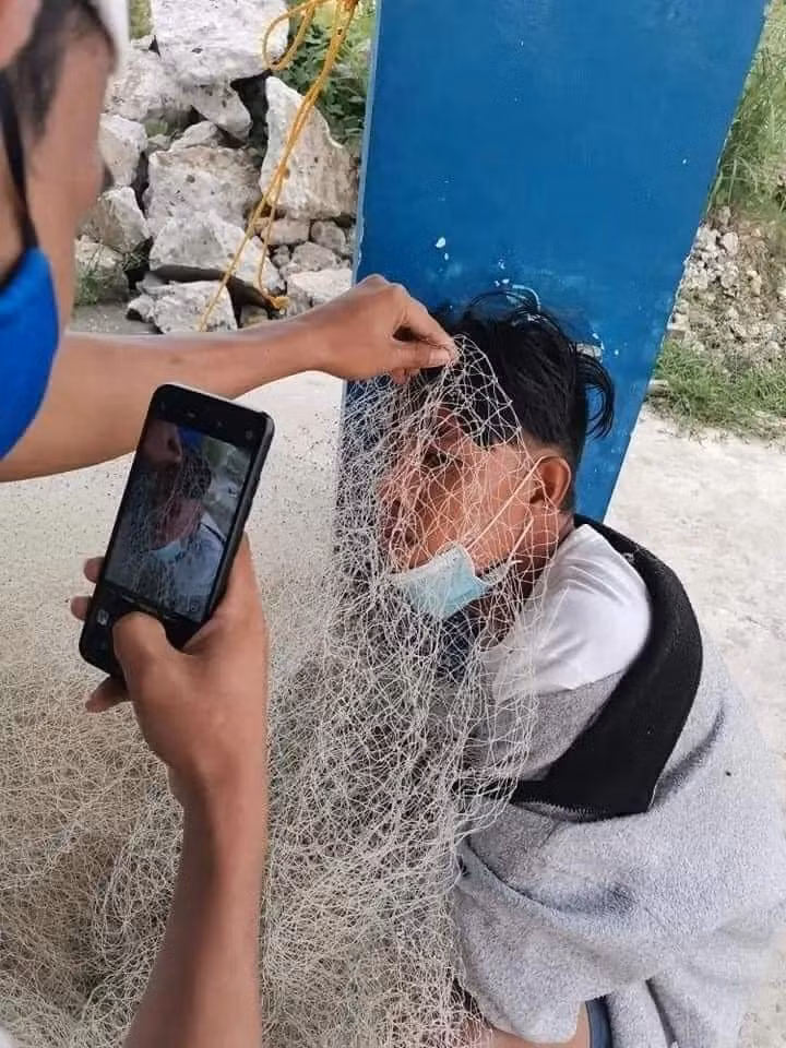 Ừ thì dùng lưới đánh cá để chụp ảnh "nghệ thuật" hơn.