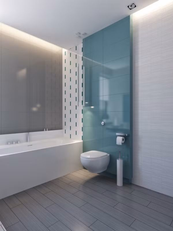 Bức tường màu xanh ngọc khiến phòng tắm trở nên mát mẻ, dễ chịu. 