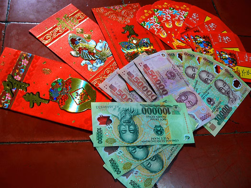 Nhiều ý kiến tỏ ra băn khoăn, liệu rằng cha mẹ giữ tiền lì xì của con có bị vi phạm Pháp luật