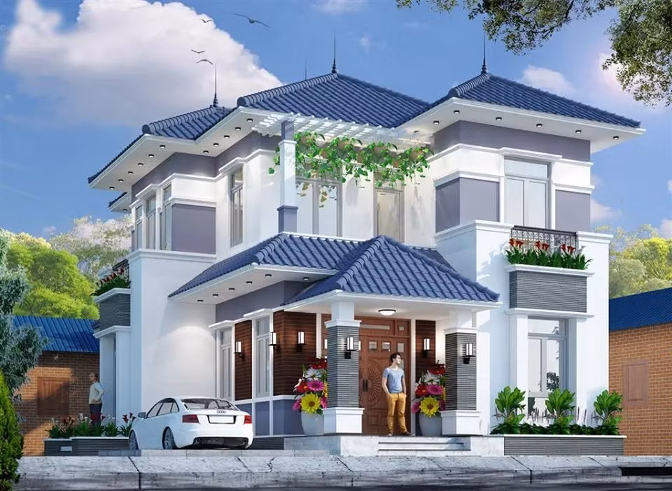 Nhà mái Nhật 2 tầng kiểu biệt thự sở hữu vẻ đẹp thanh lịch, sang trọng và gần gũi với thiên nhiên. Mẫu nhà phù hợp với gia chủ có diện tích đất rộng. Ảnh: Spacet