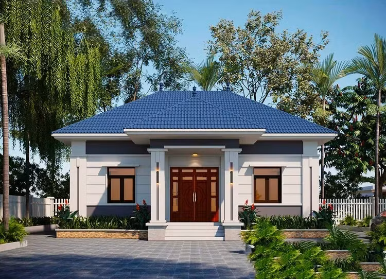 Mẫu nhà cấp 4 mái Nhật nhỏ, có sân vườn và cây cối xung quanh. Ảnh: Spacet