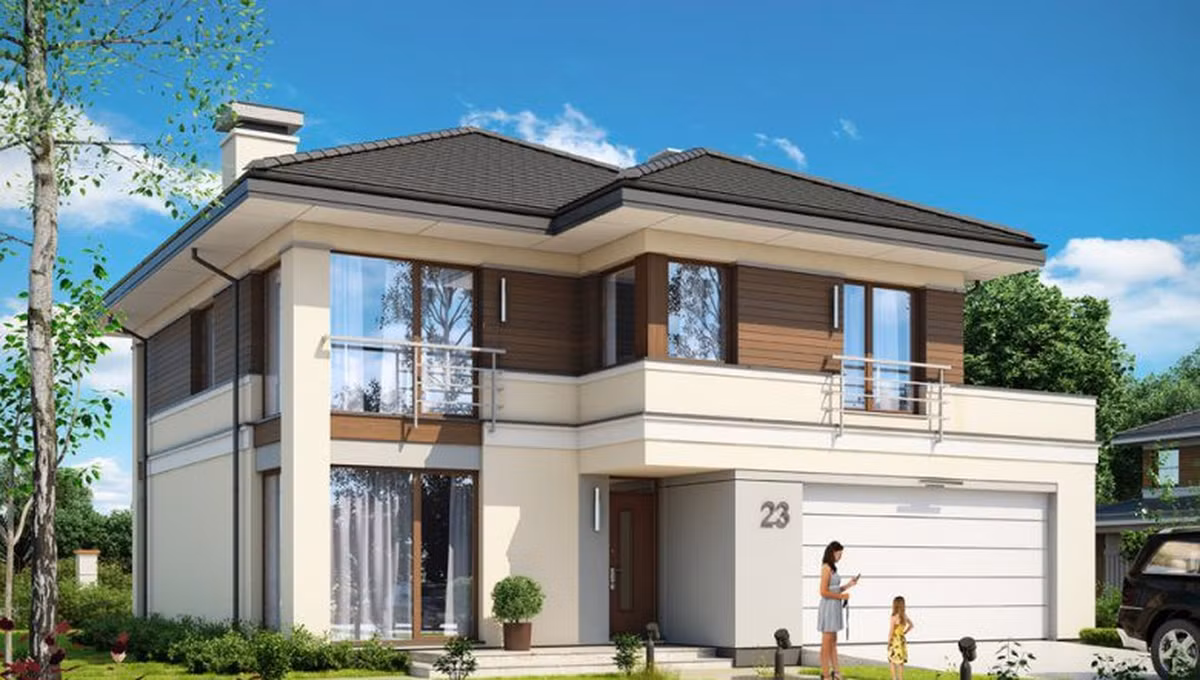 Ngôi nhà 2 tầng sử dụng màu kem tạo sự nhẹ nhàng, tinh tế, xung quanh là sân vườn rộng rãi. Ảnh: Angcovat