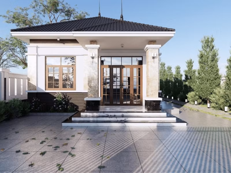 Mẫu nhà mái Nhật 1 tầng sử dụng gam màu trắng chủ đạo, có sân vườn rộng rãi, phù hợp với các gia đình ở nông thôn. Ảnh: Alonhaxinh