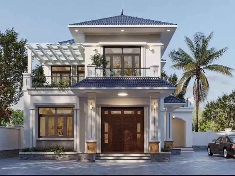 Mẫu nhà mái Nhật 2 tầng hiện đại sở hữu hình khối vuông vức, đường nét khỏe khoắn. Phần mái có độ dốc vừa phải, giúp thoát nước nhanh chóng và chống thấm hiệu quả. Ảnh: Spacet
