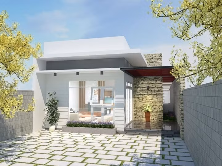 Phần trước ngôi nhà được xây thành từng trụ lớn ốp đá vân nổi bật. Ở phần mái thiết kế thêm một không gian gác xép, có cửa sổ. Ảnh: Internet