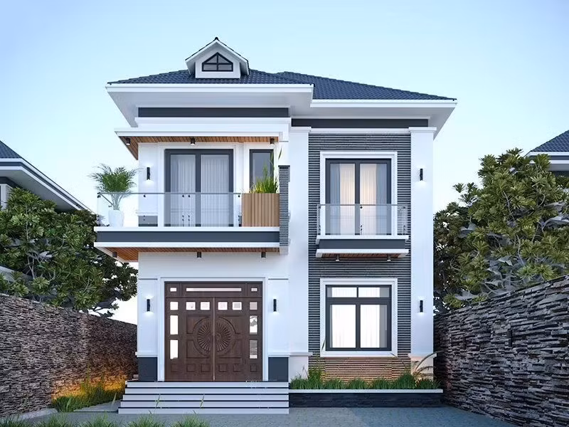 Mẫu nhà mái Nhật 2 tầng thiết kế đơn giản nhưng vẫn ấn tượng bởi màu sơn trắng phối xanh đẹp hút mắt. Ảnh: Xaynhdeponline