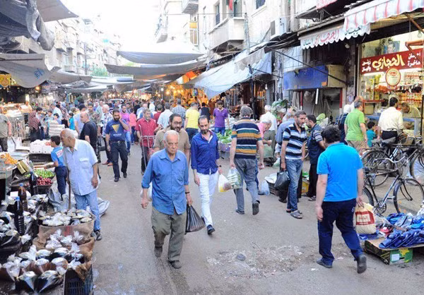 Góc chợ đông đúc ở thủ đô Damascus dịp tháng lễ Ramadan. Ảnh: FNA.