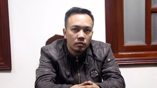 Minh tại cơ quan công an. Ảnh Công Lý.