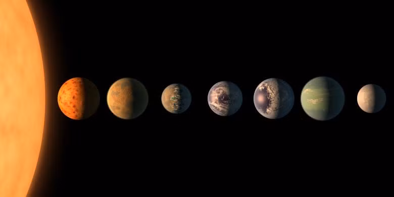 TRAPPIST-1b cùng 6 hành tinh khác cùng thuộc hệ TRAPPIST-1 cách chúng ta 378 nghìn tỉ năm ánh sáng.
