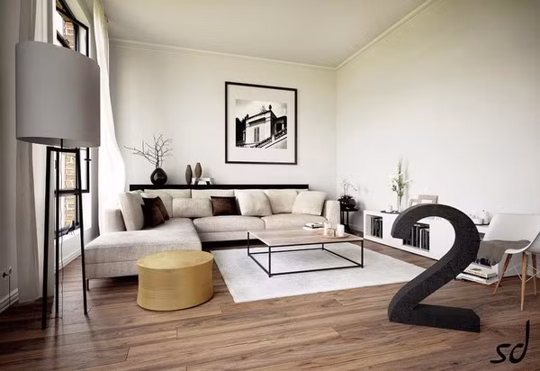 Mẫu phòng khách này rất dễ ứng dụng cho căn hộ nhỏ. Chiếc sofa chữ L màu sáng đáp ứng tối đa được nhu cầu chỗ ngồi cho các thành viên trong gia đình đồng thời không bị cảm giác nặng nề như khi lựa chọn sofa màu tối. Chiếc bàn nước nhỏ gọn theo dạng bàn khung thép cũng giúp gia tăng sự gọn gàng, ngăn nắp cho nơi này.